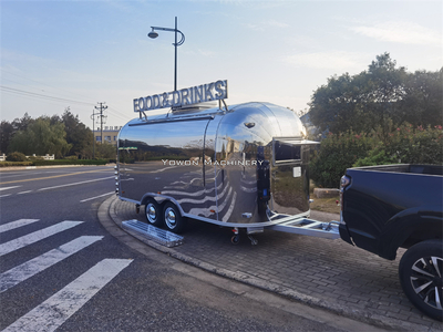 Customized for the European market, this fully stainless steel food concession trailer comes with full COC certification and is designed to be operated by 2–3 staff members